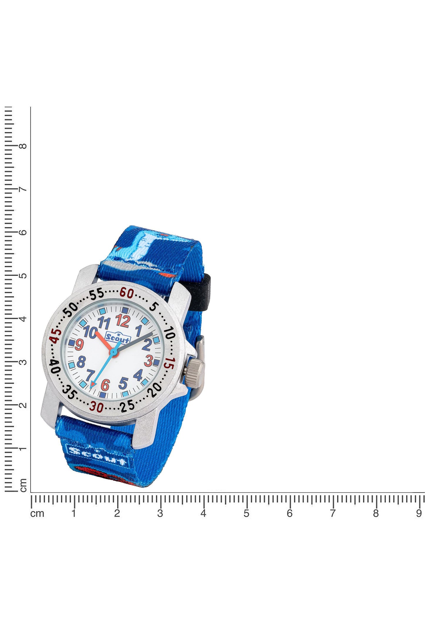 Scout Kinderuhr Action mit blauem Textilband, Dino-Motiven und weißem Lernzifferblatt für Jungen neben einem Lineal zur Größendarstellung