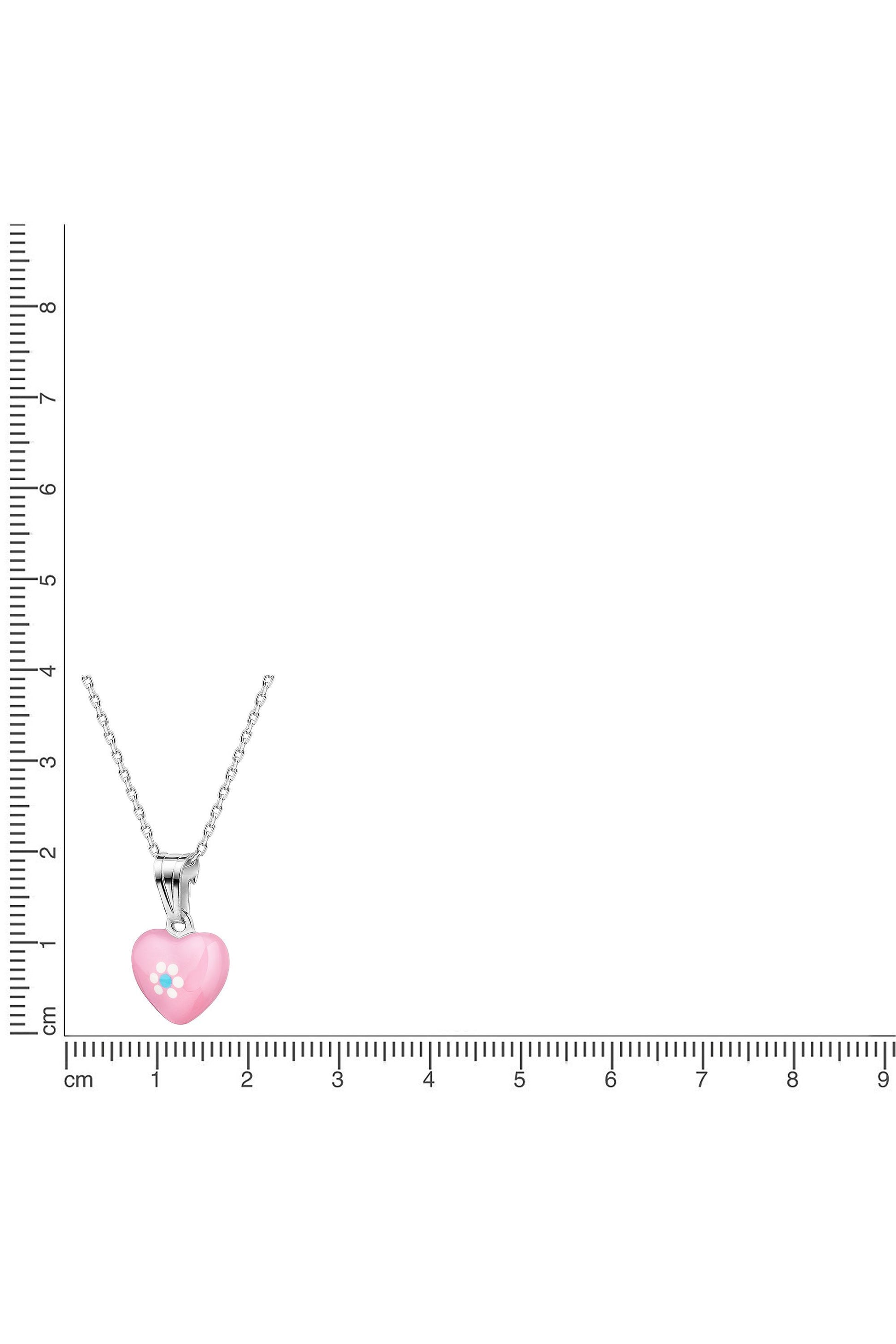 Silberne Scout Kette mit rosa Herz Anhänger neben einem Lineal zur Größendarstellung