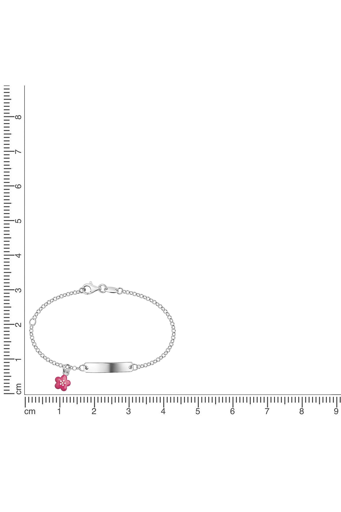Silbernes Scout Armband mit pinker Blume neben einem Lineal zur Größendarstellung
