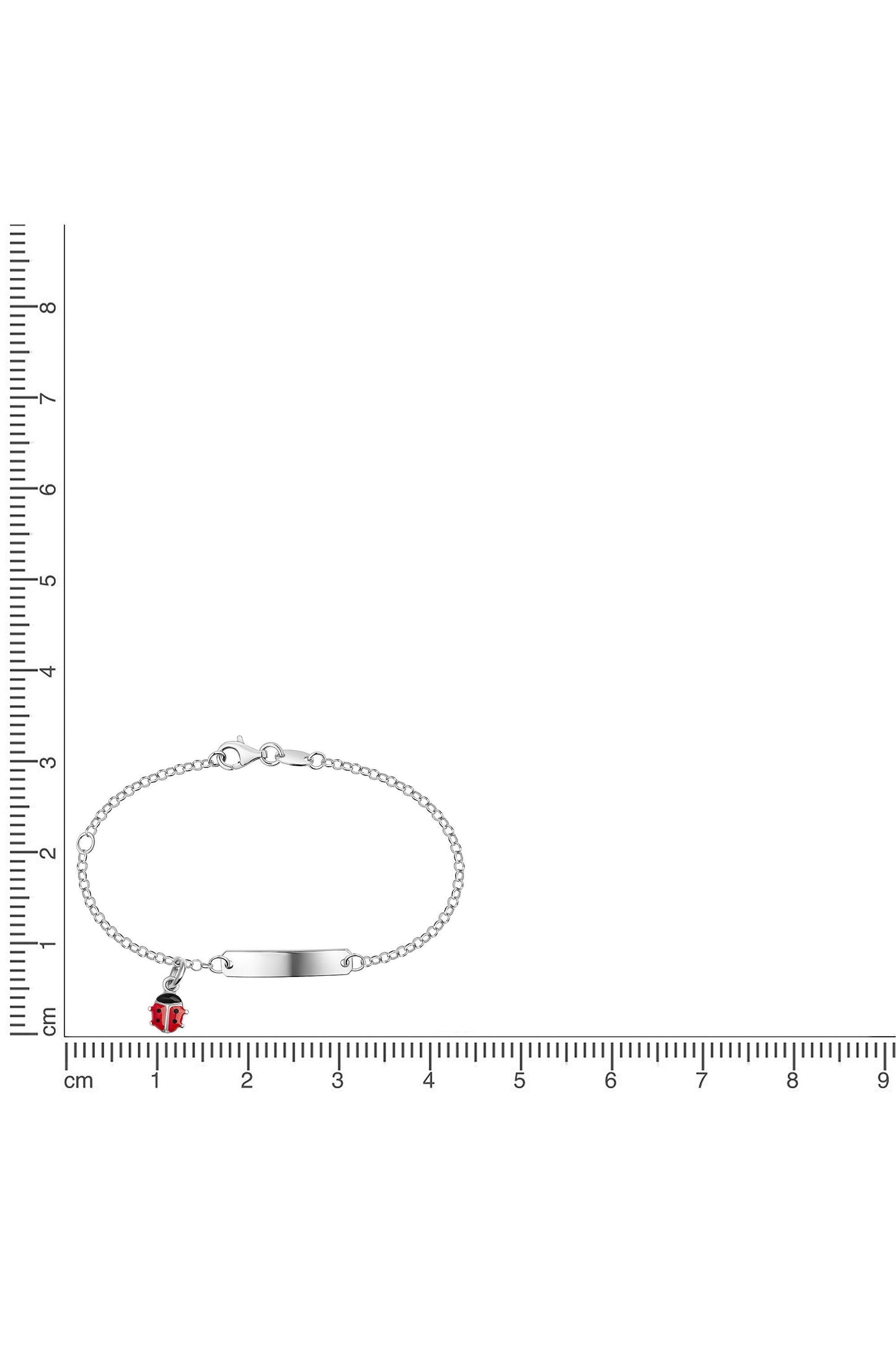 Silbernes Scout Armband mit Marienkäfer neben einem Lineal zur Größendarstellung